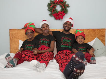 Family in matching black Family: A Little Bit of Crazy Christmas tees in bed