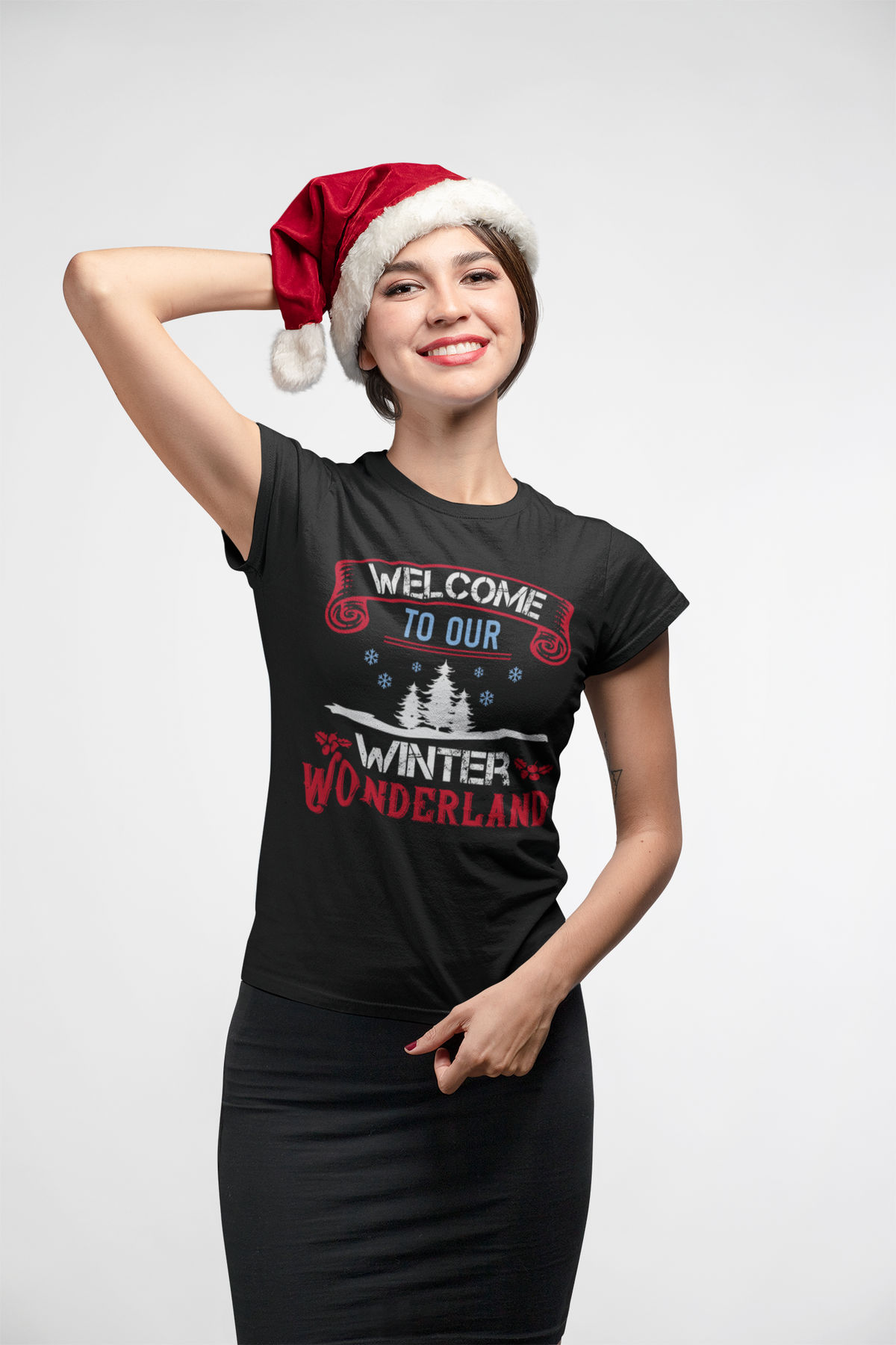 Woman wearing the Welcome to Our Winter Wonderland black t-shirt
