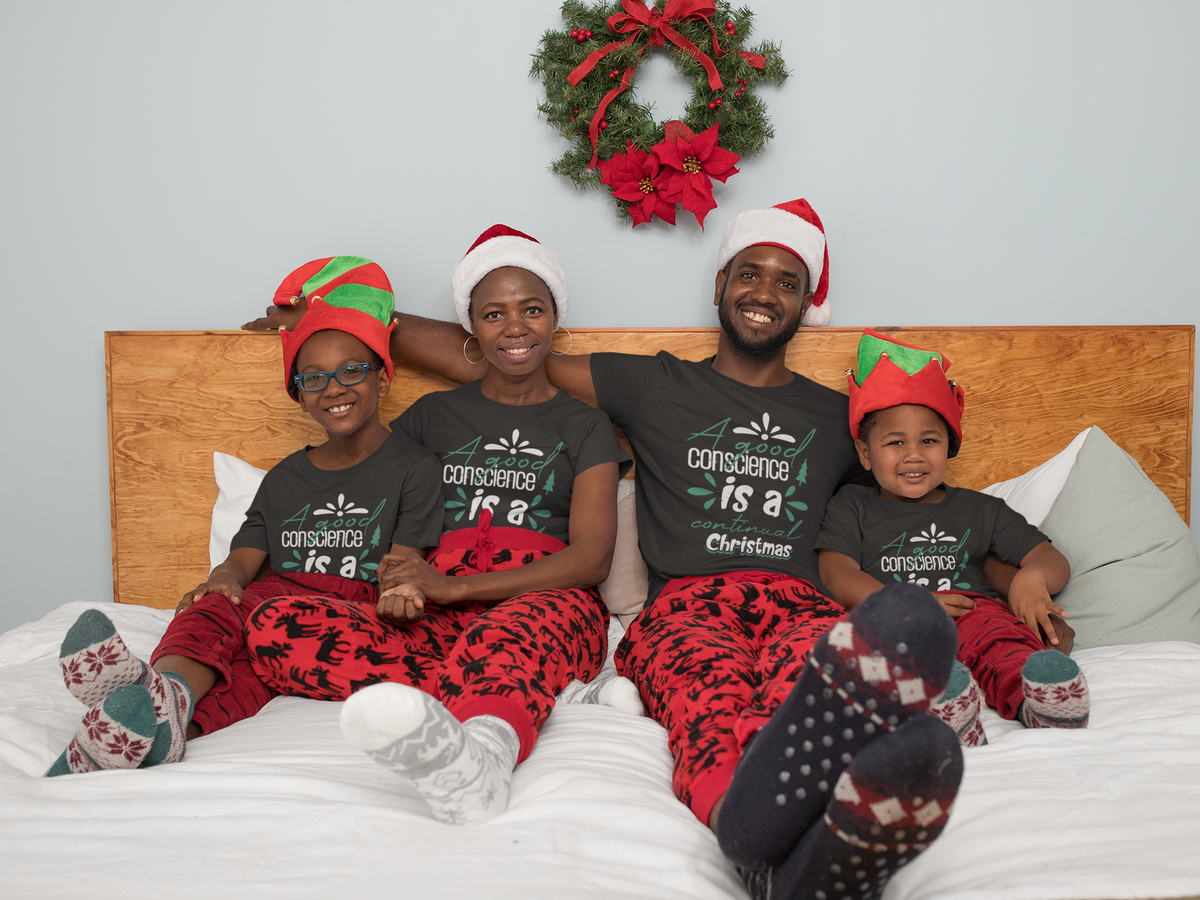 Matching family wearing A Good Conscience Is a Continual Christmas shirts