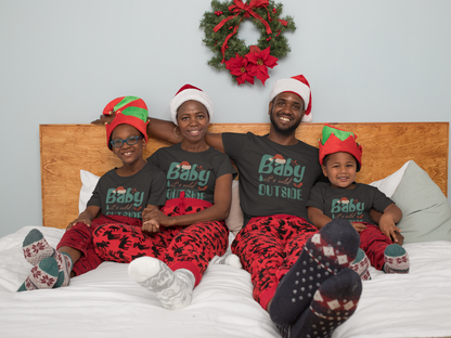 Matching family wearing Baby, It's Cold Outside Christmas shirts