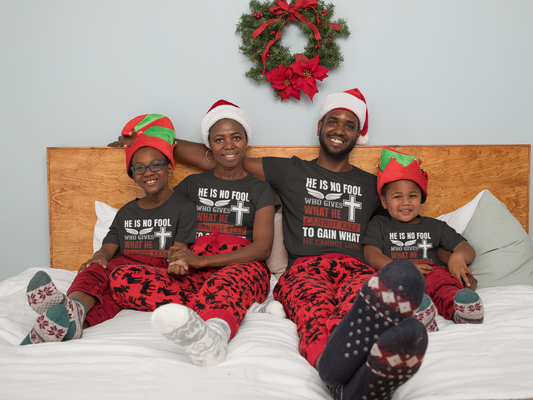 Matching family wearing He Is No Fool Who Gives What He Cannot Keep Christian Christmas shirts