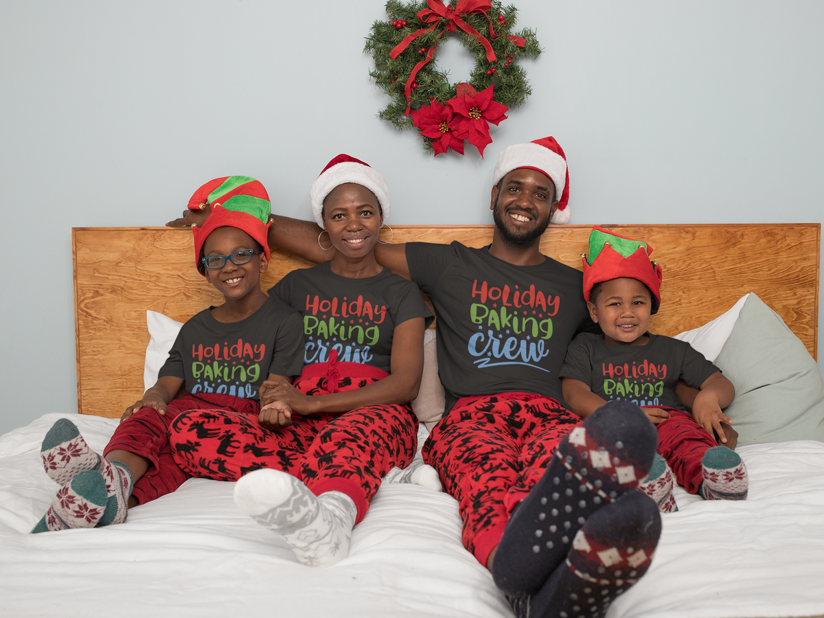 Matching family wearing Holiday Baking Crew Christmas shirts