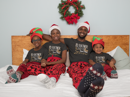 Matching family wearing I'd Rather Shovel Sand Than Snow Christmas shirts