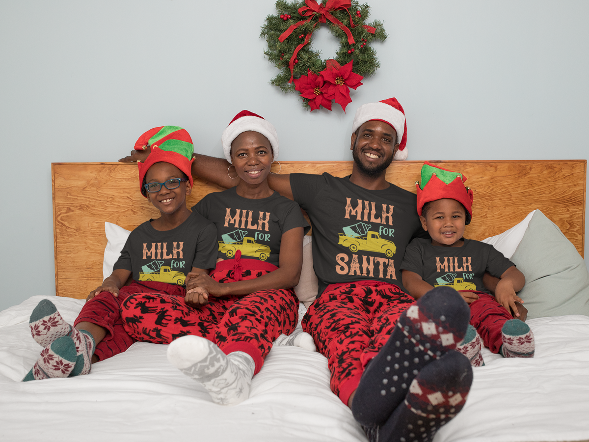 Matching family wearing Milk for Santa Christmas shirts