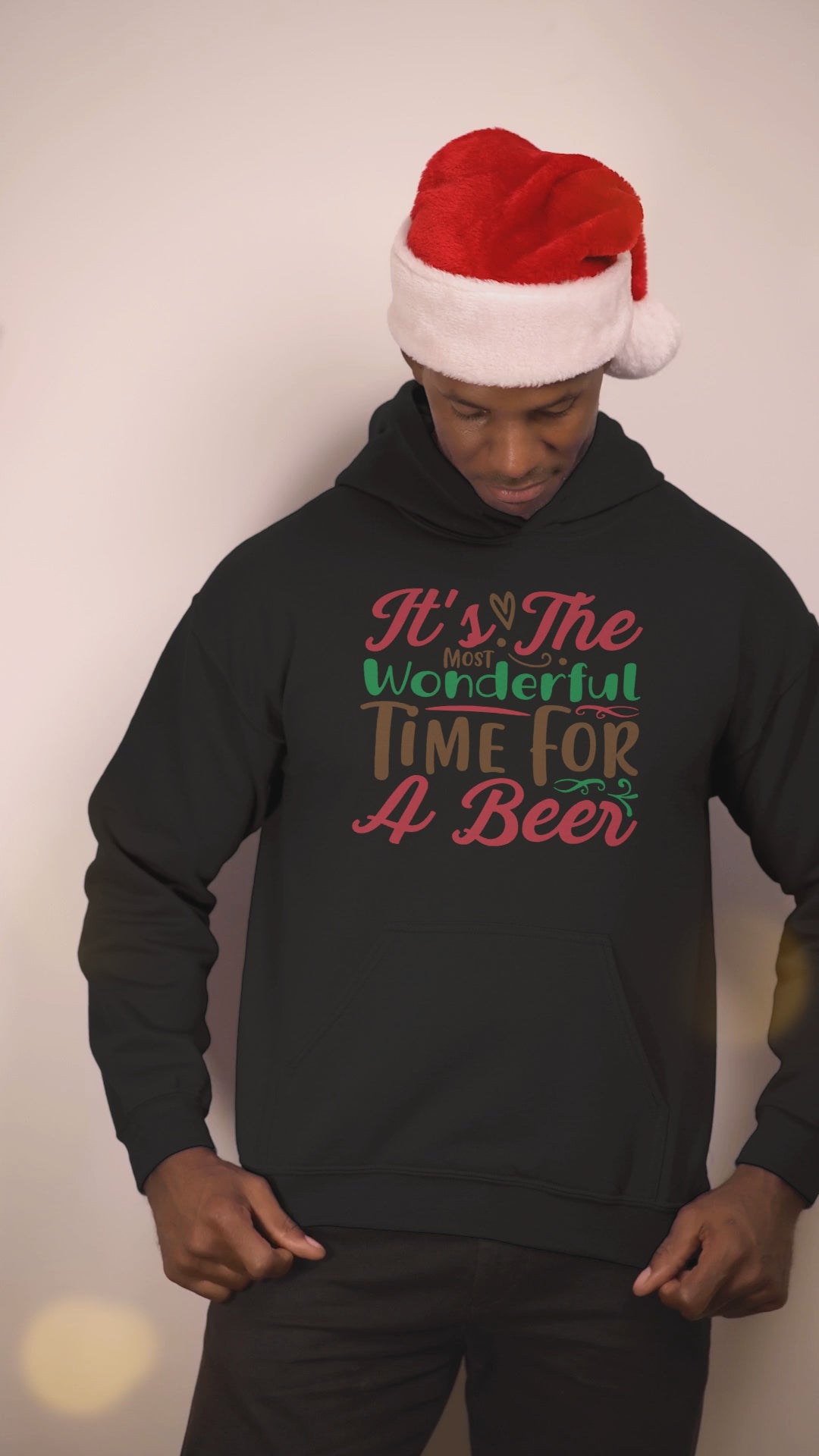 Video of a man wearing the Most Wonderful Time for a Beer black hoodie