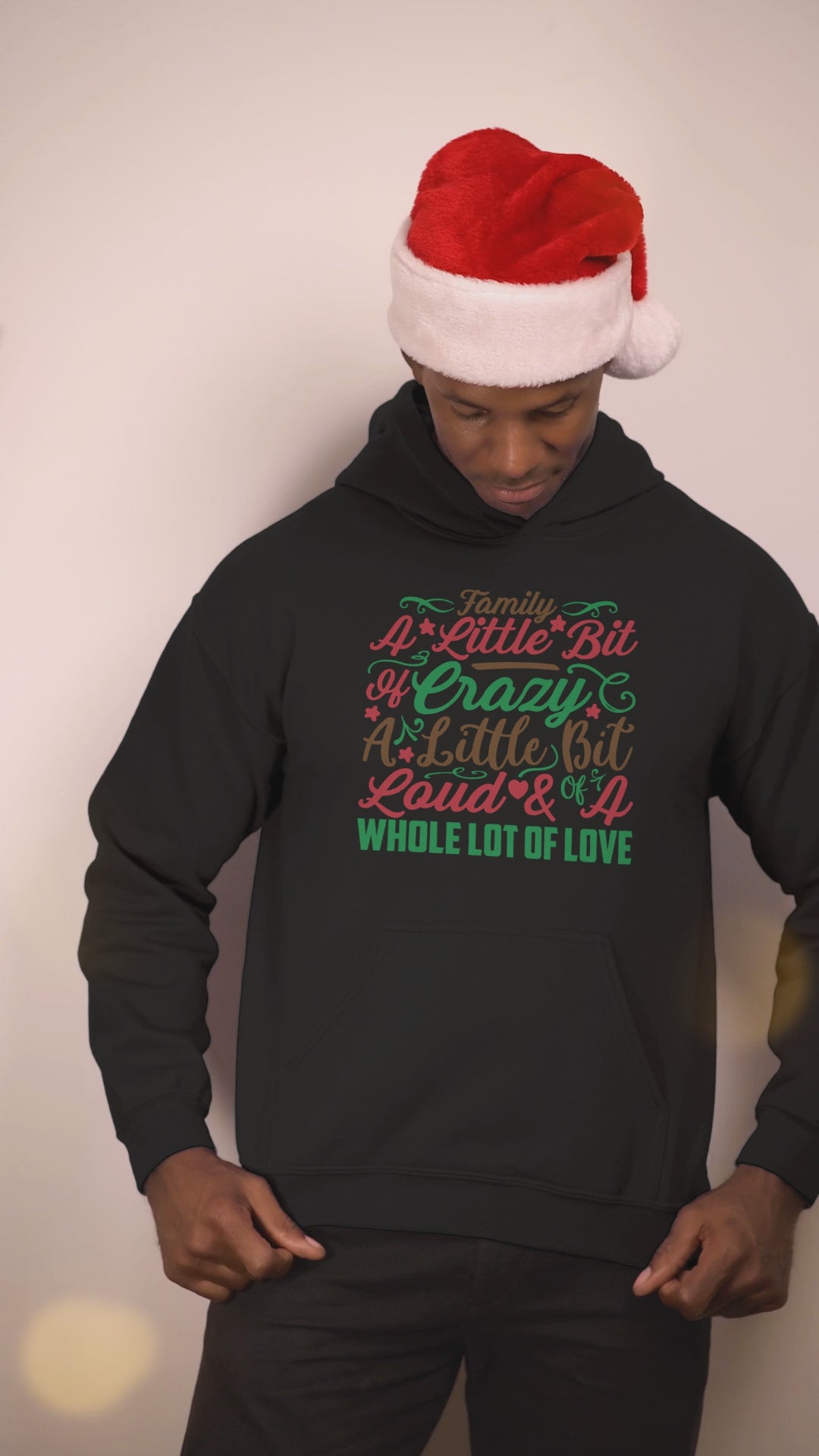 Video of a man wearing the Family: A Little Bit of Crazy black hoodie