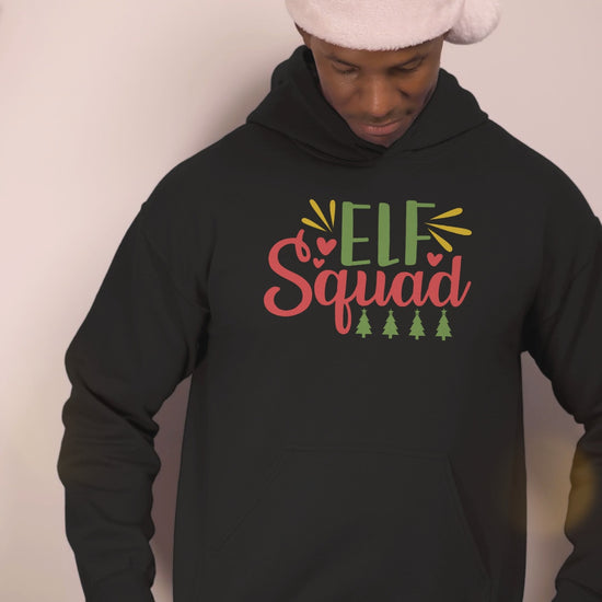 Video of a man wearing the Elf Squad black Christmas hoodie