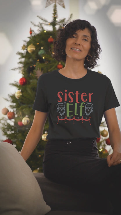 Video of a woman wearing the Sister Elf black Christmas t-shirt